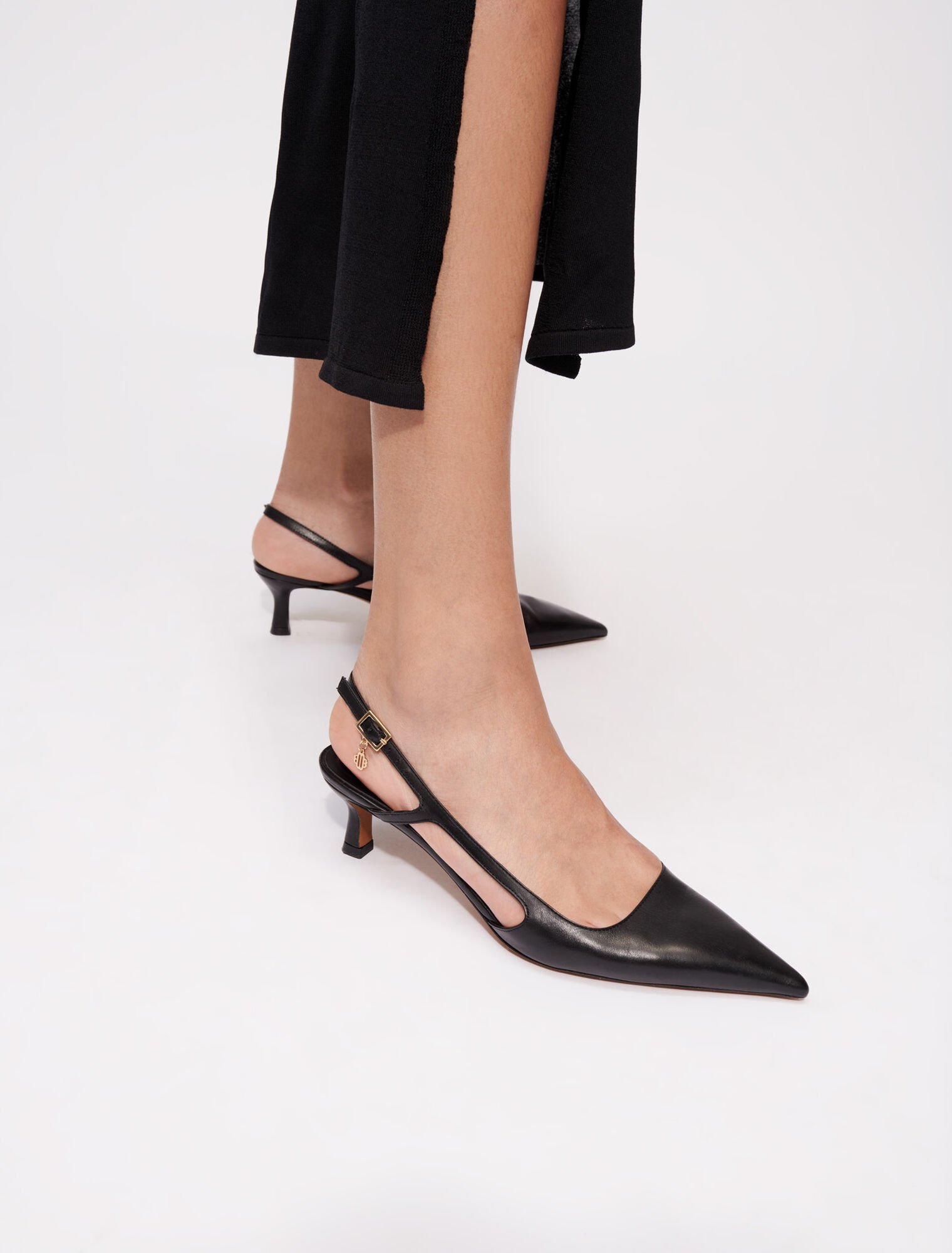 Pointed-toe pumps with straps