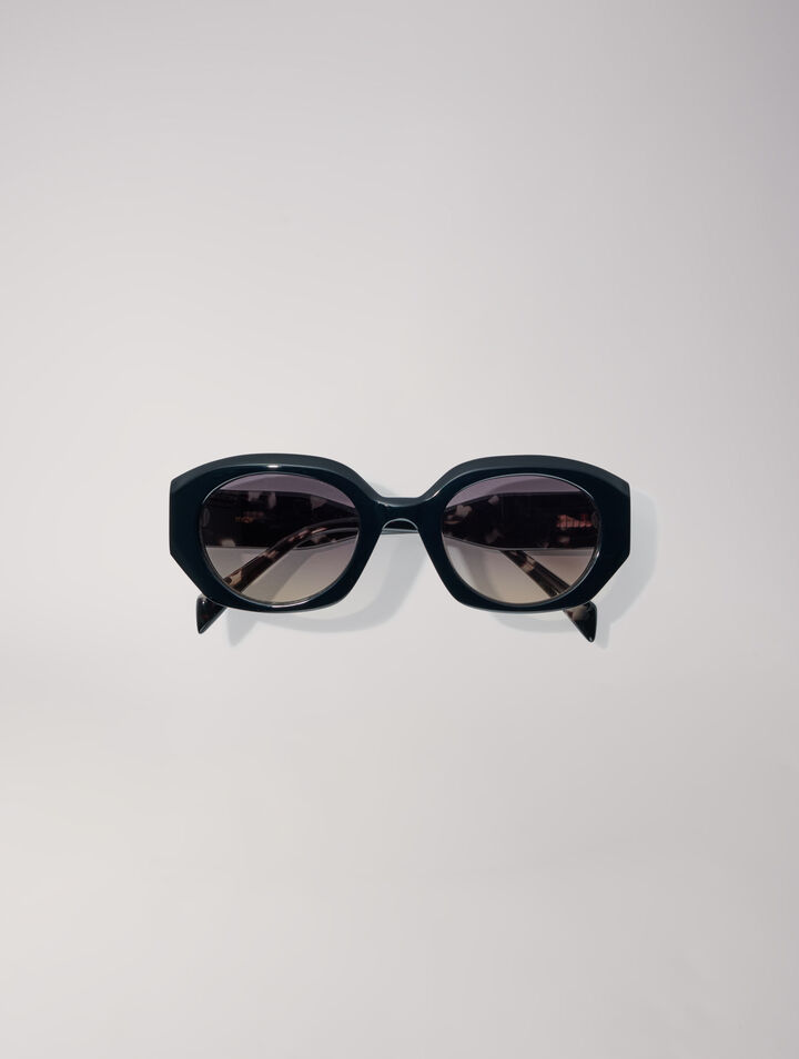 Round acetate glasses