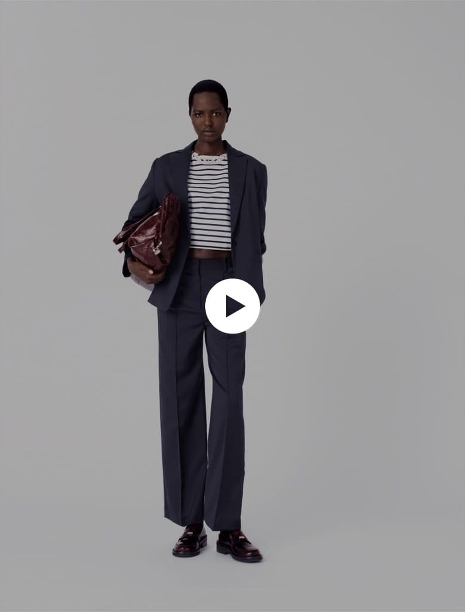 Suit jacket with pleated back