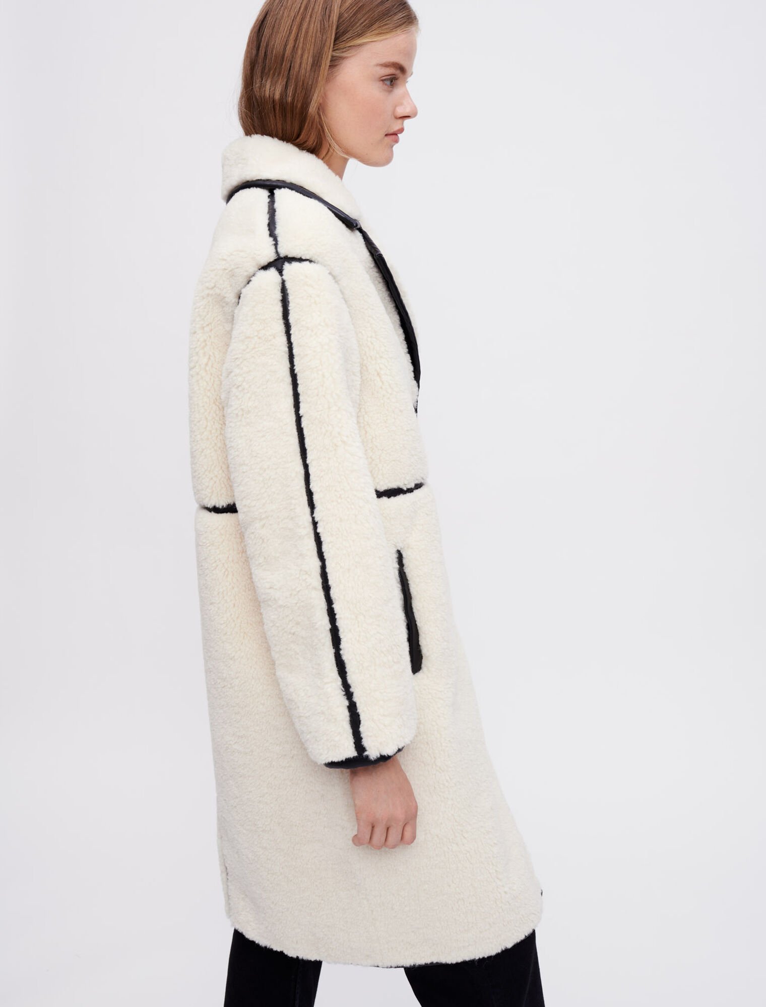 Faux sheepskin and vinyl coat