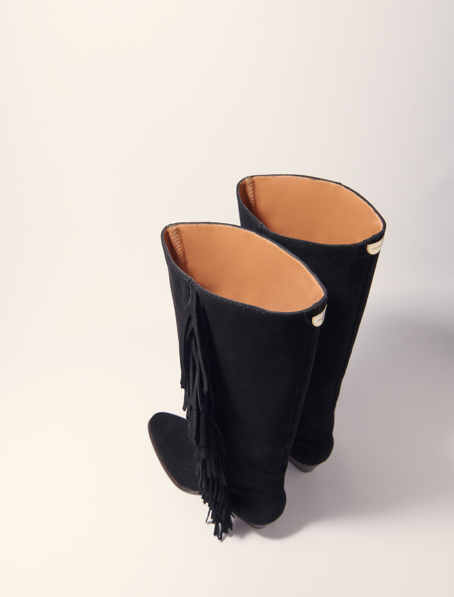 Fringed suede cowboy boots