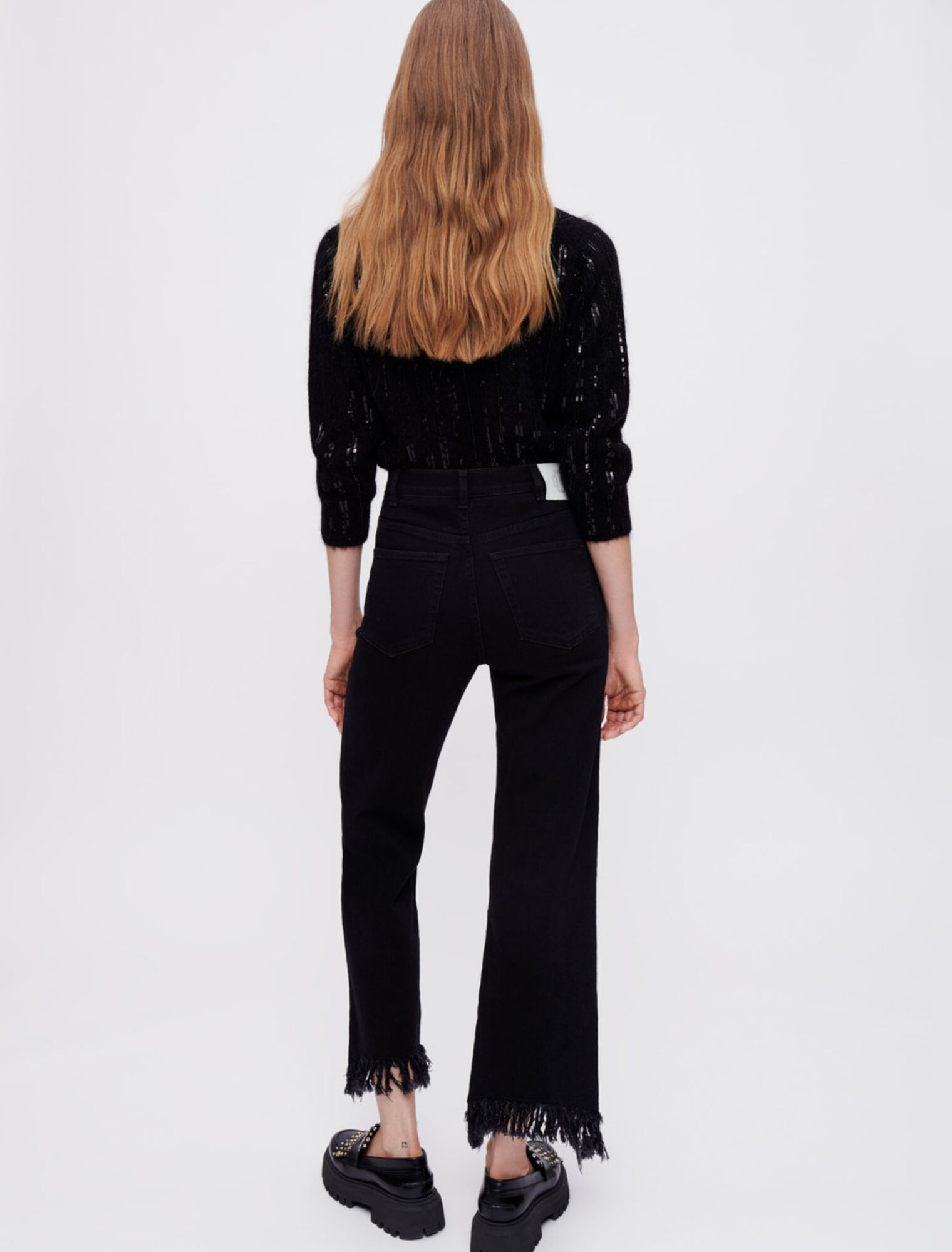 Black high-waisted jeans ripped