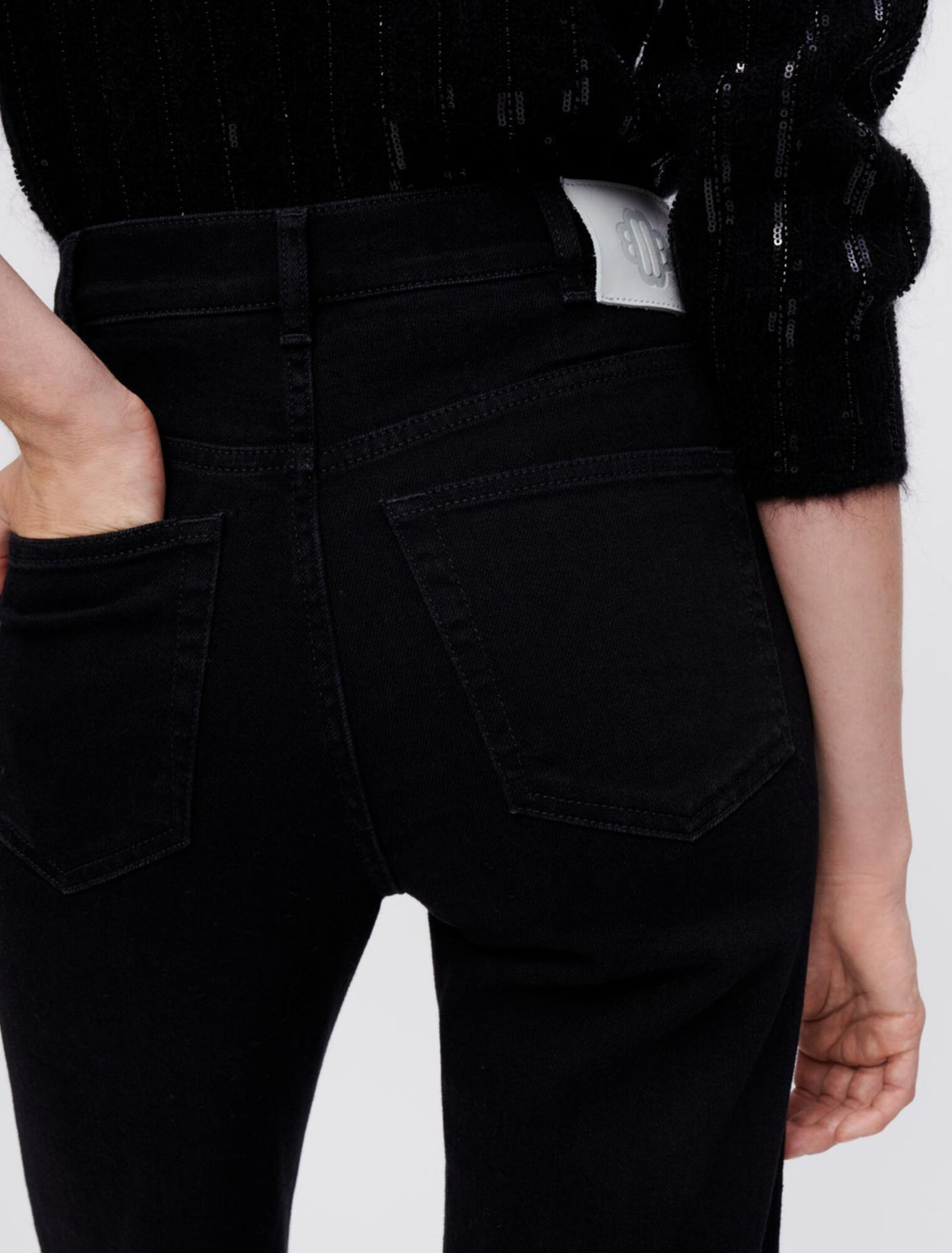 Black high-waisted jeans ripped