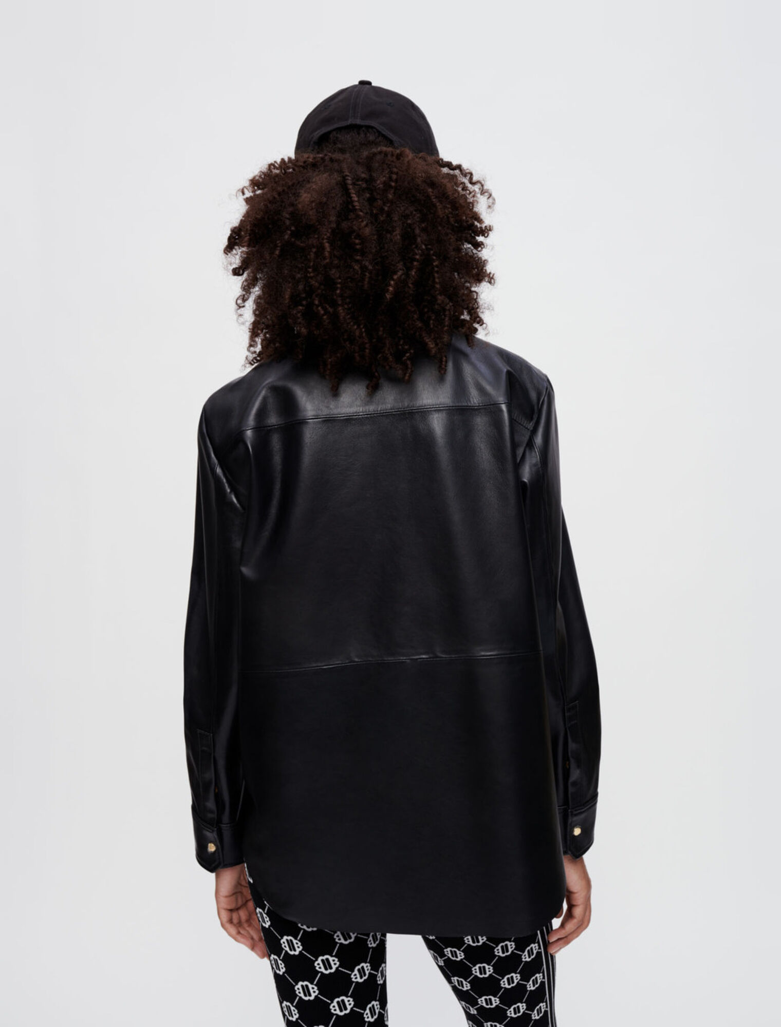 Black leather shirt with gold horsebits
