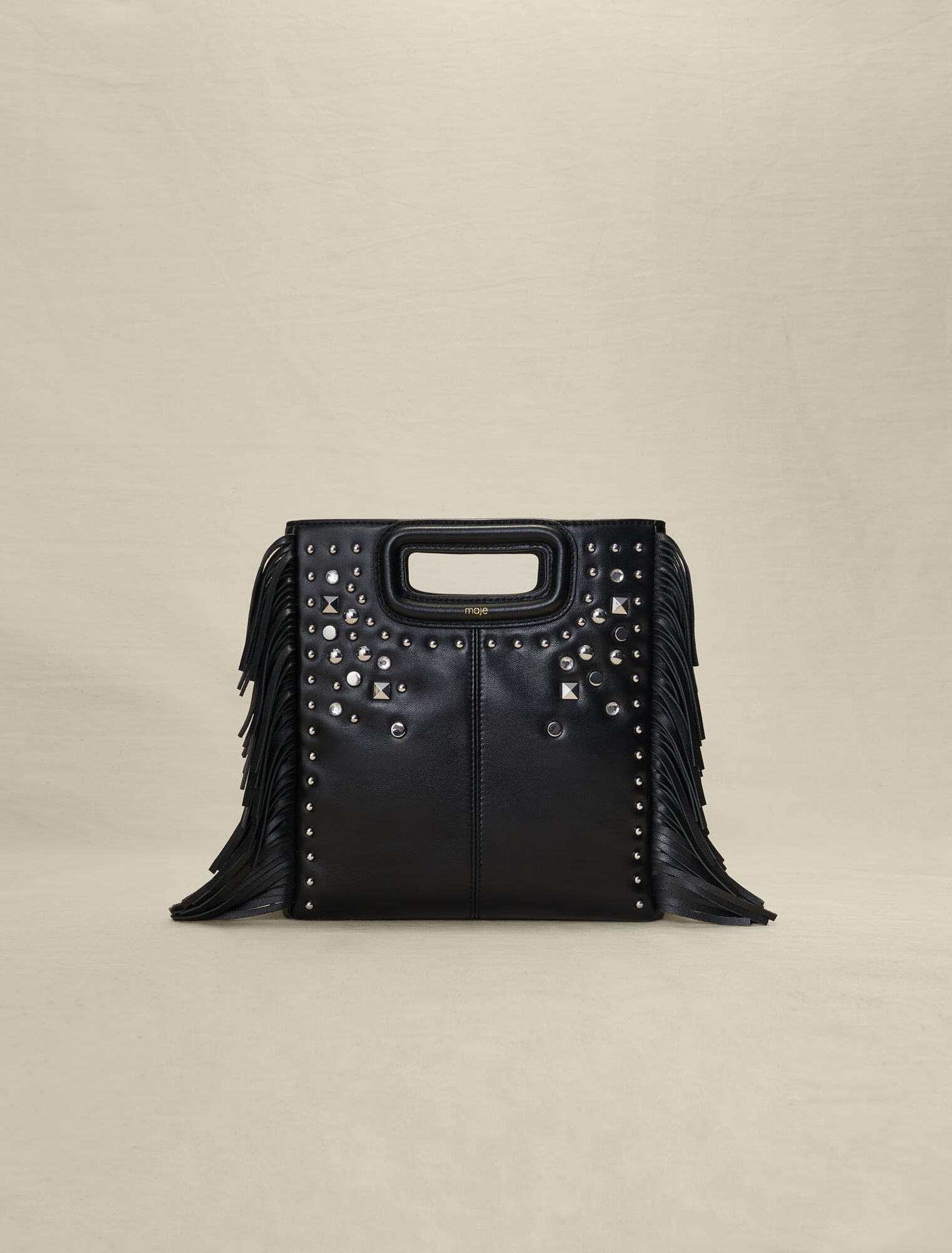 Studded leather M bag with fringing