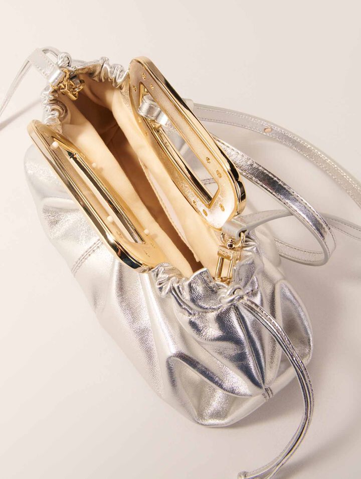 Leather metal handle clutch