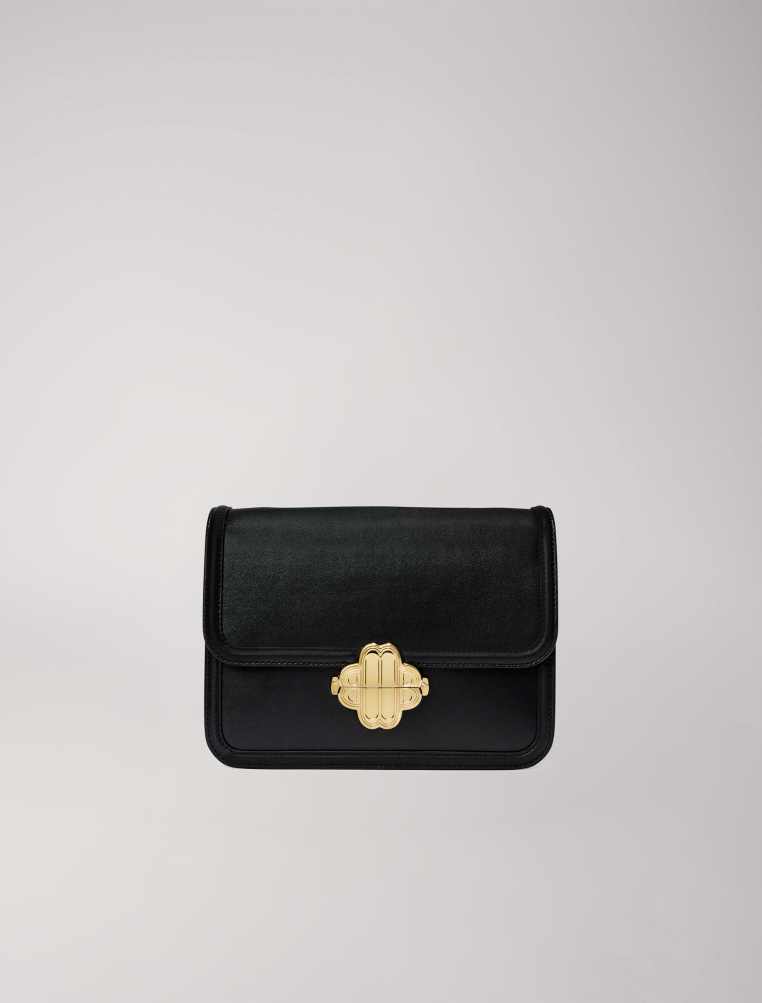 Leather bag with clover clasp