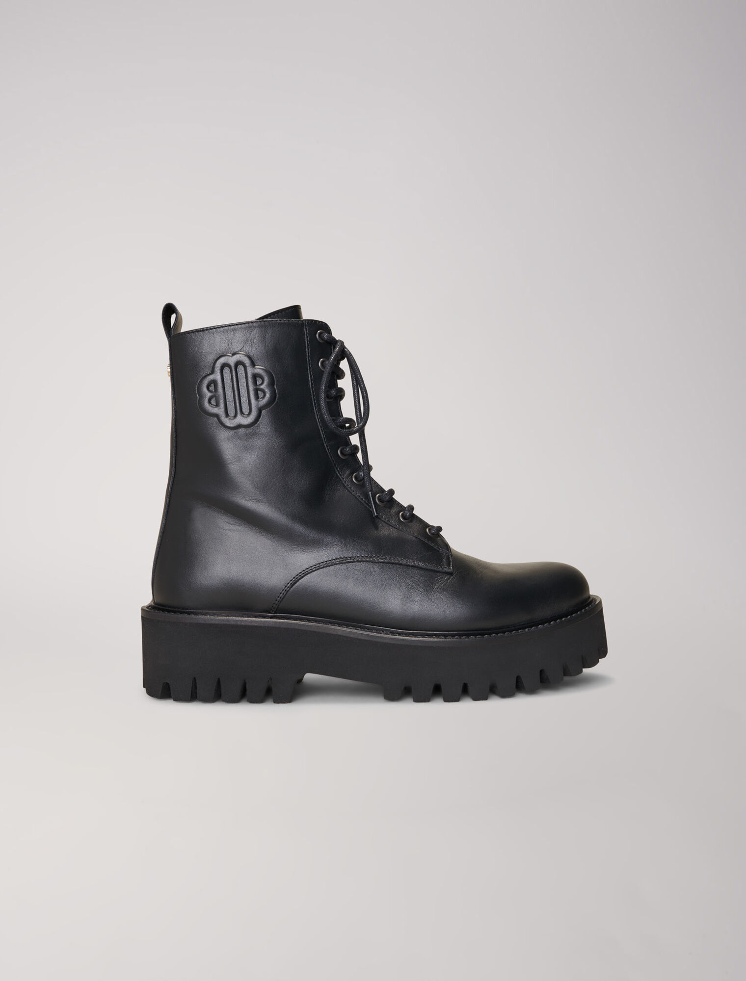 Black leather lace-up boots
