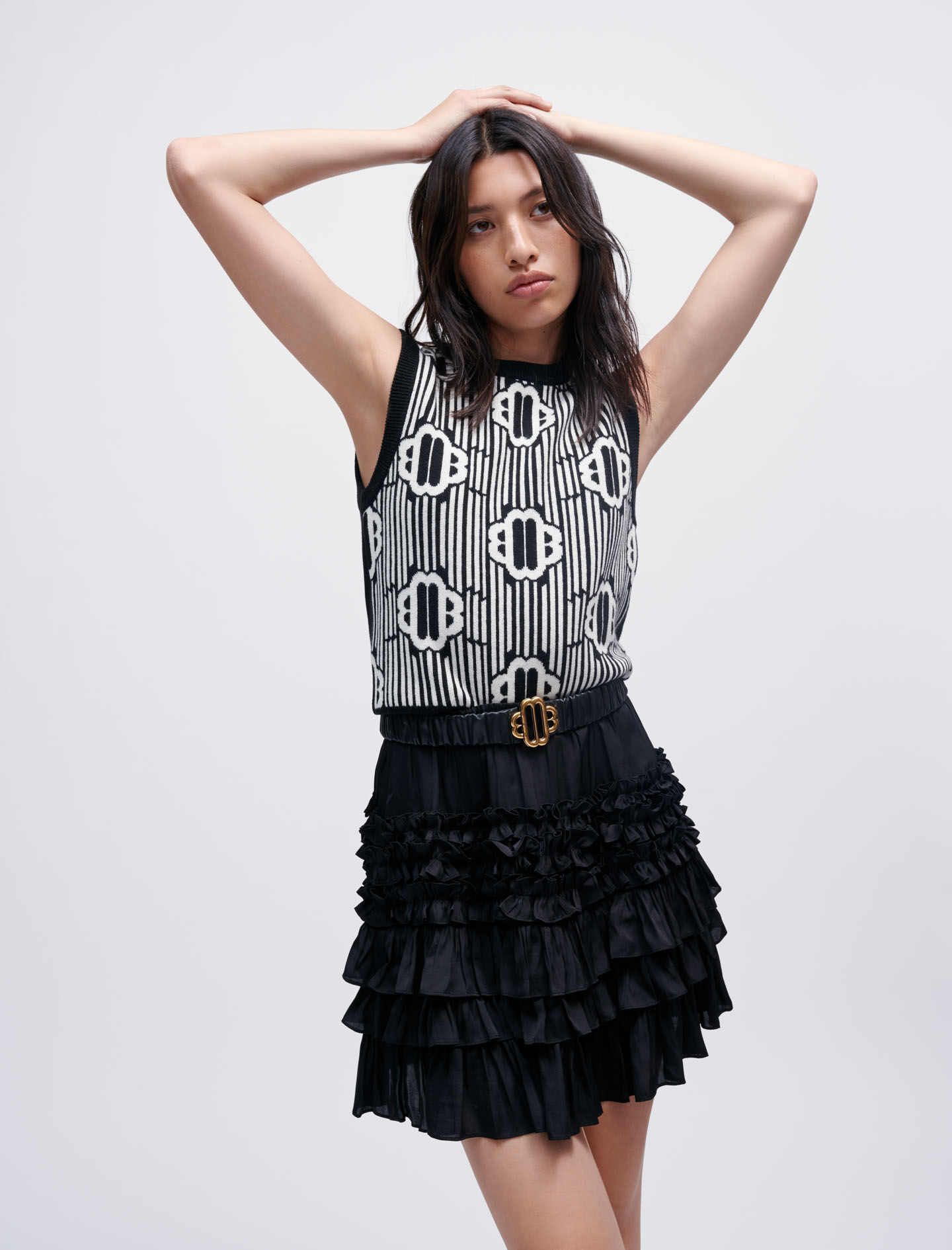 Short black ruffle skirt on sale