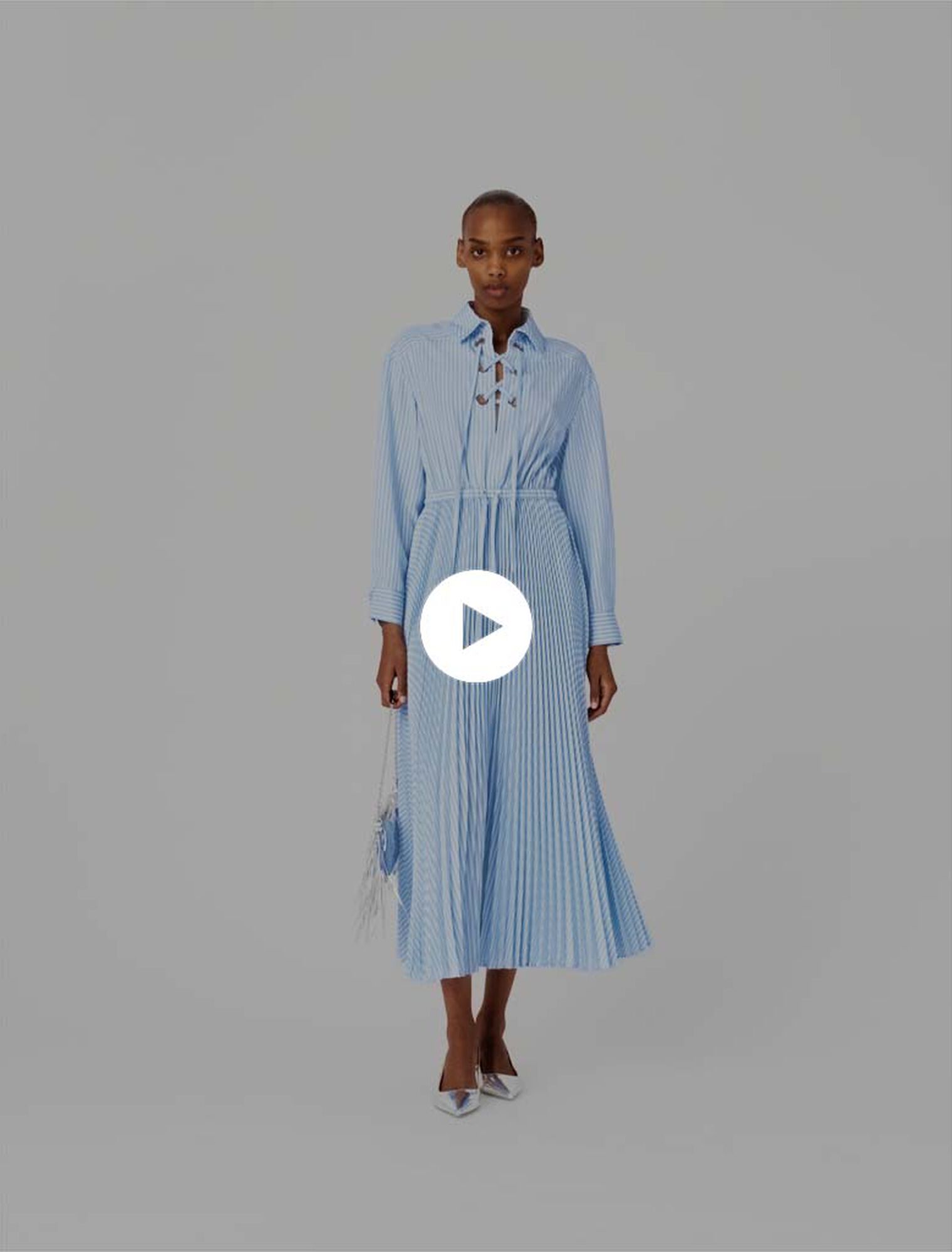 Long pleated dress with eyelets