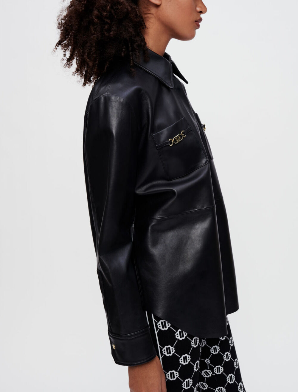 Black leather shirt with gold horsebits