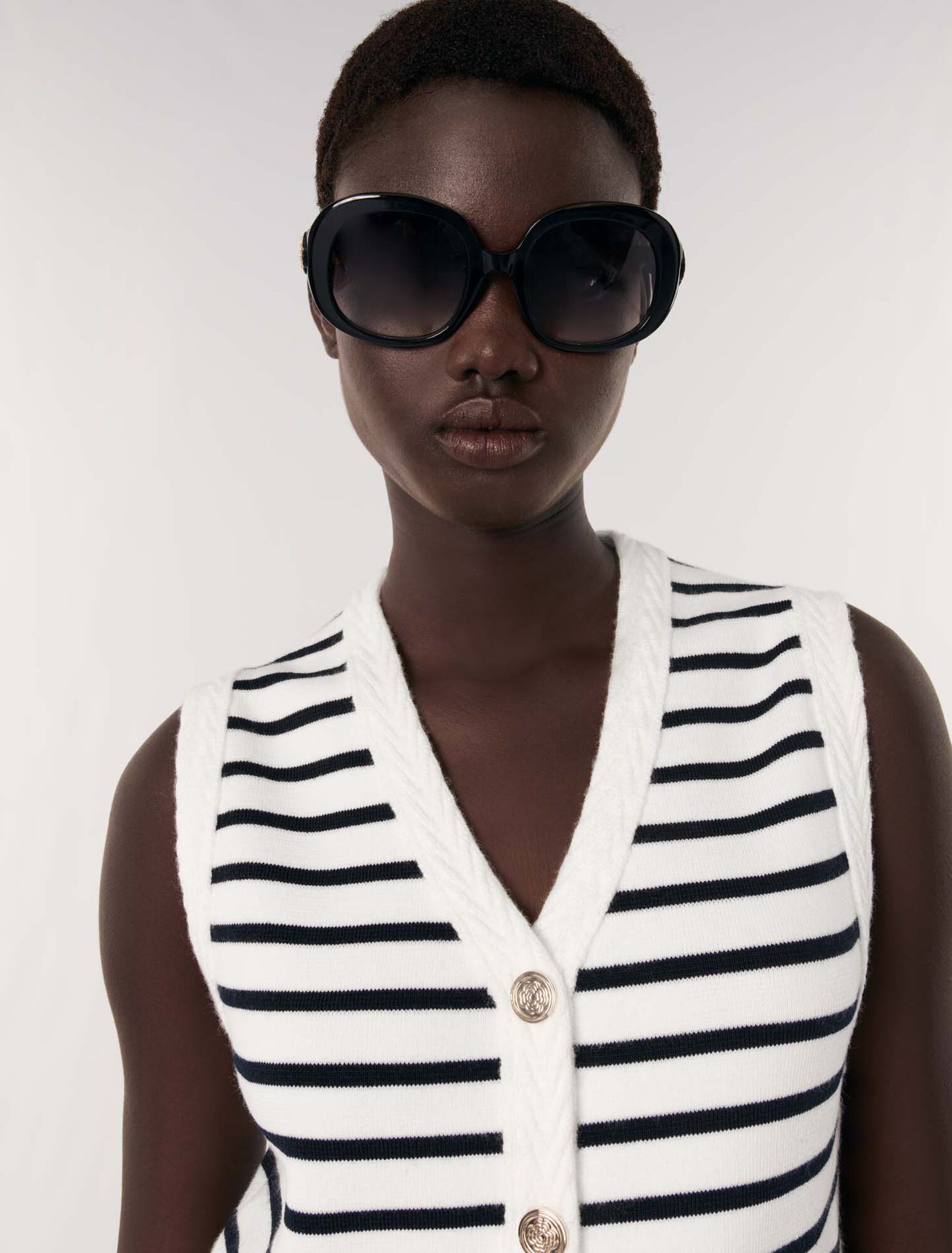 Sleeveless striped cardigan