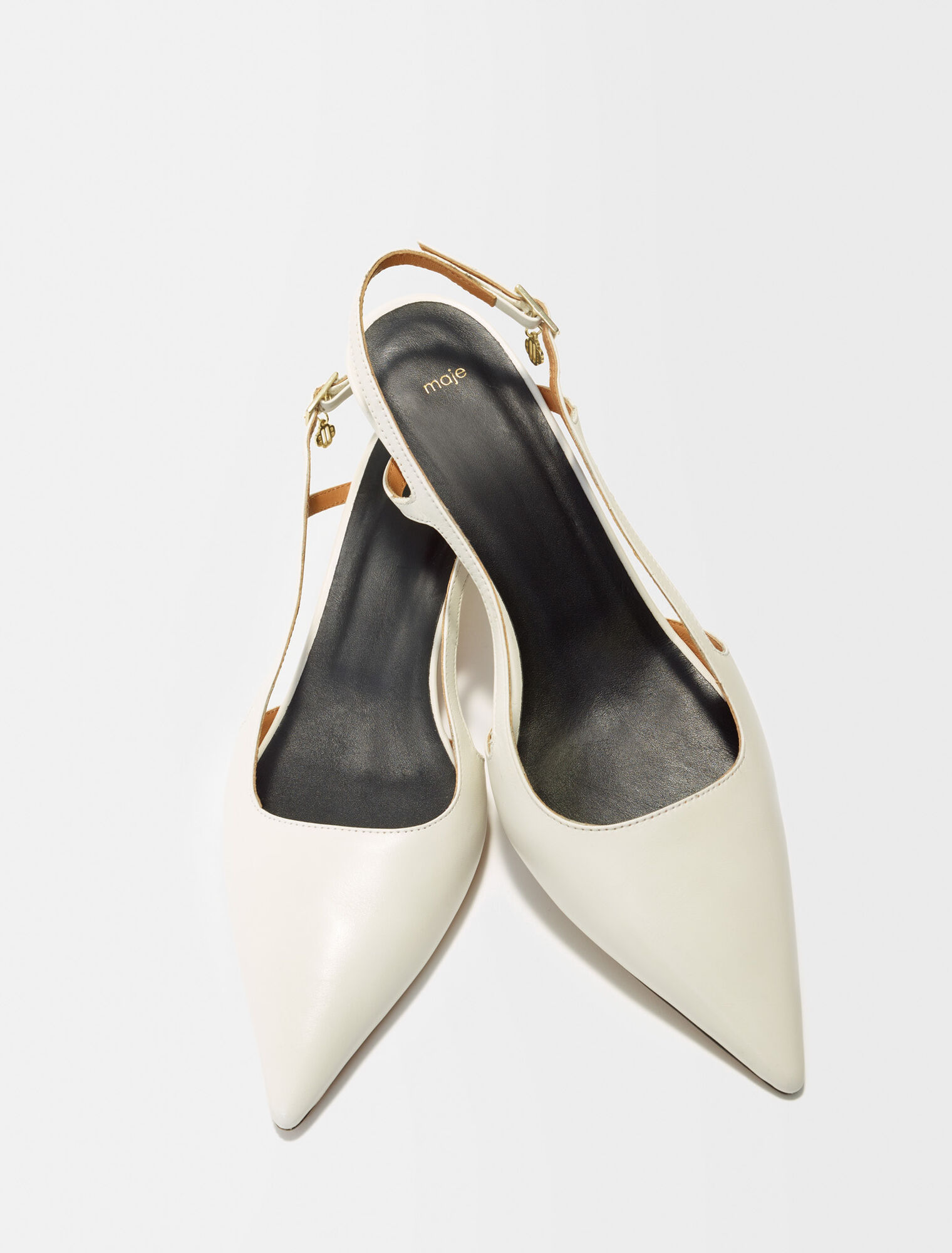 Pointed-toe pumps with straps