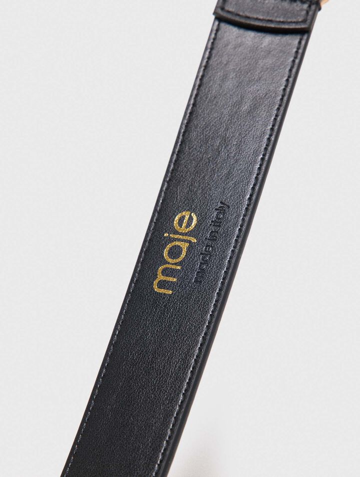 Leather belt with oval buckle