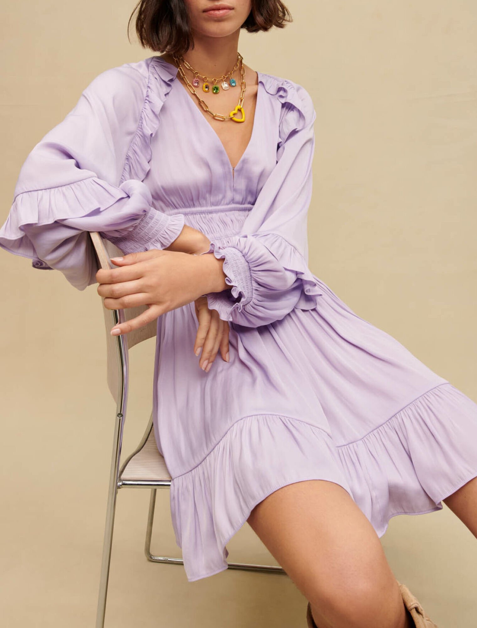 Short satiny dress with ruffles