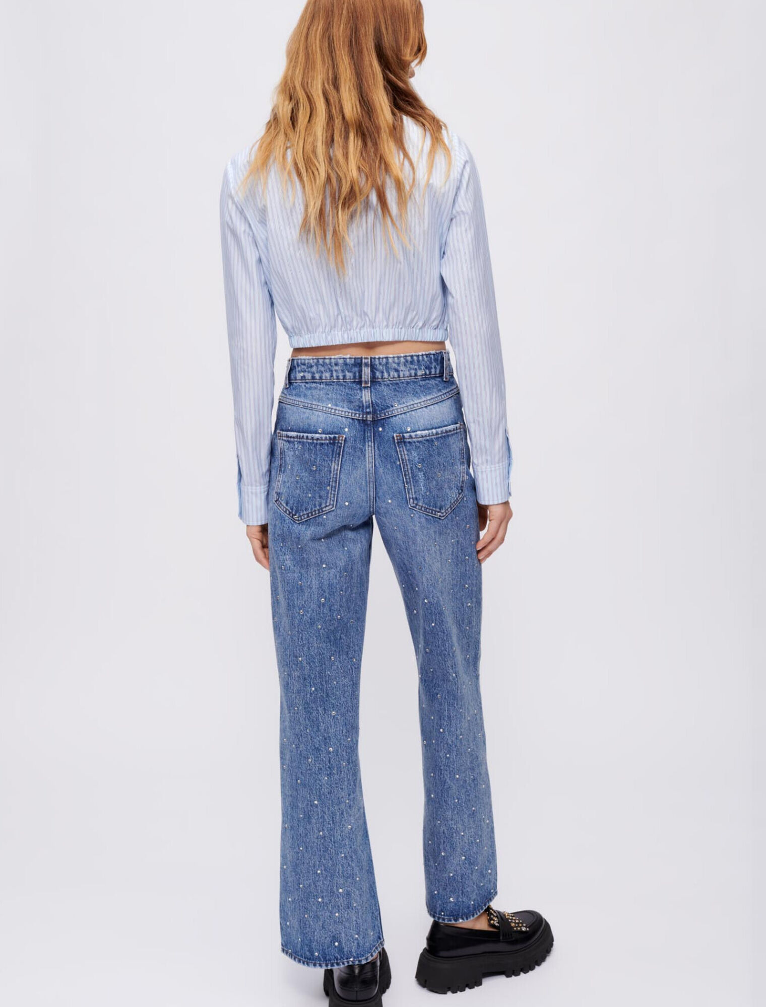 High-waisted jeans with rhinestones