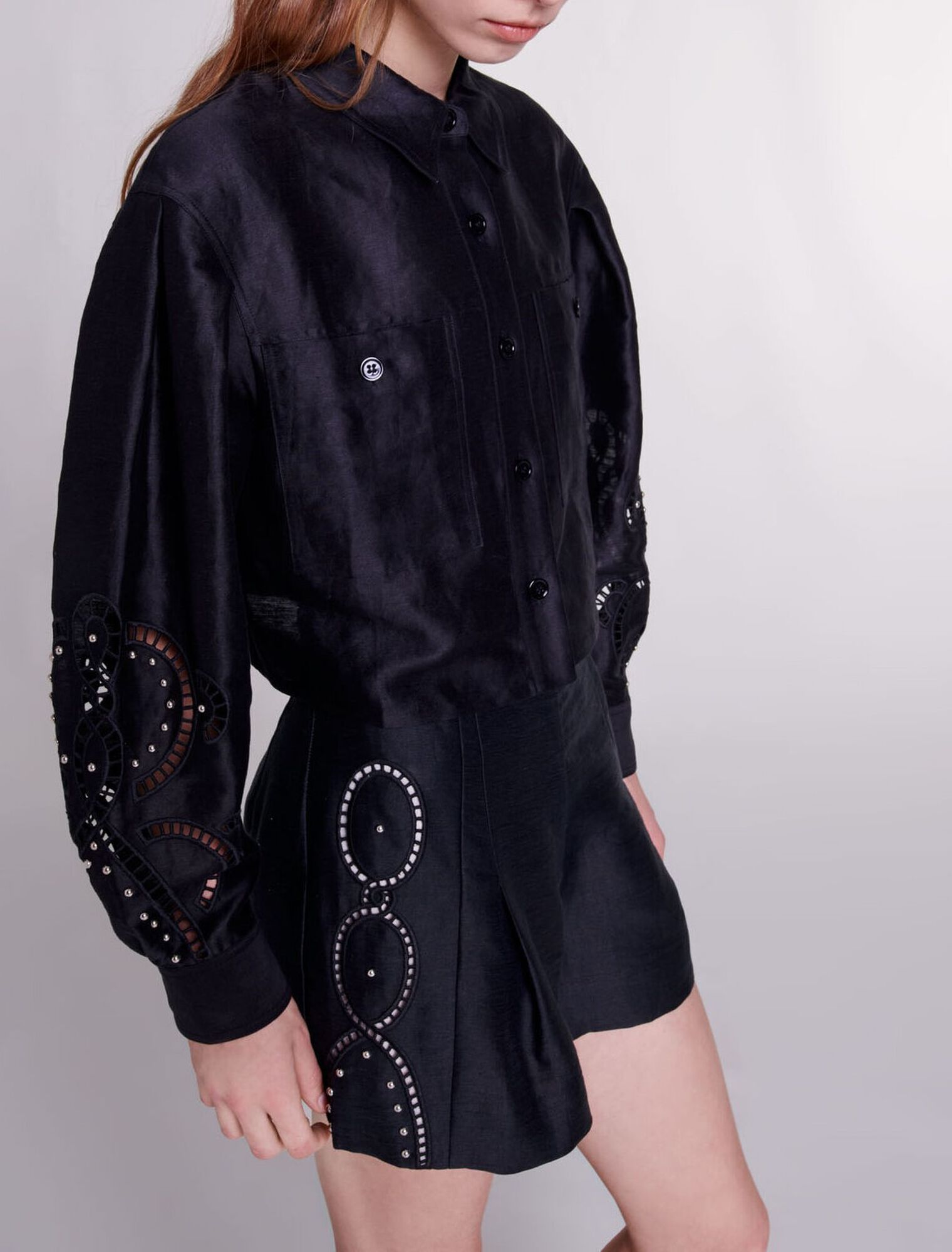 Openwork linen shorts with rivets