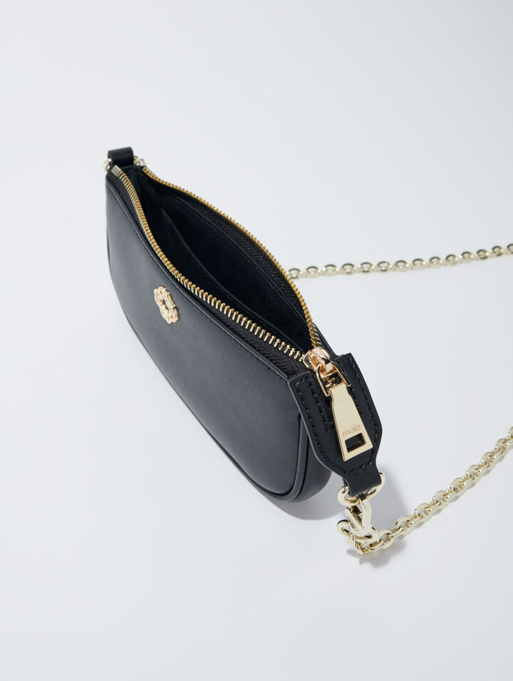 Small leather clutch bag