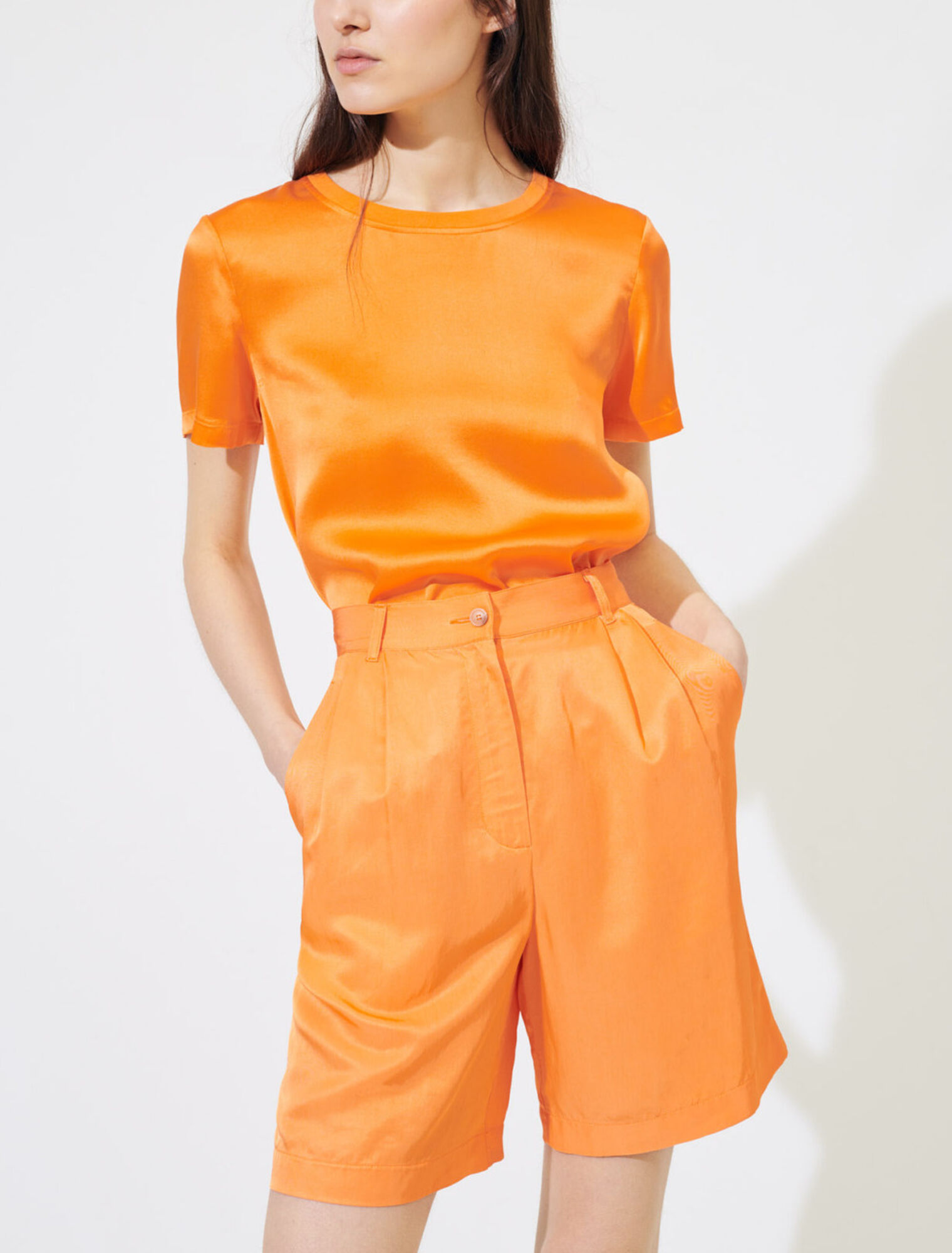 Flared satin shorts