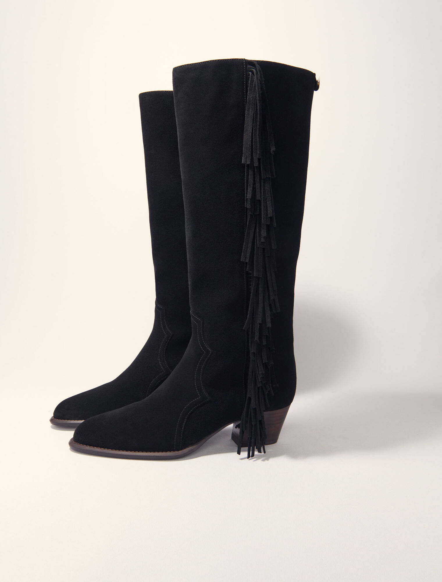 Fringed suede cowboy boots