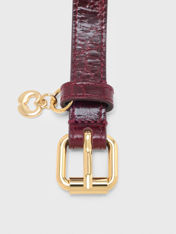 Slim leather belt with eyelets
