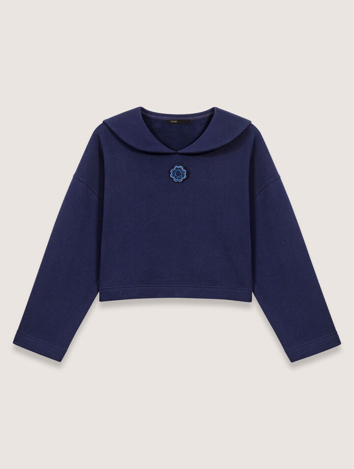 Short sweater with embroidery