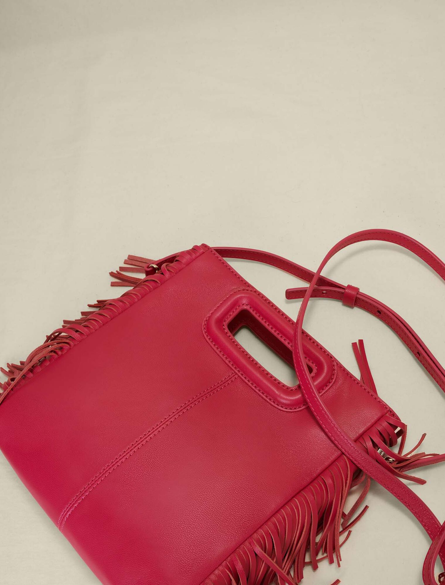 Smooth leather M bag with fringing