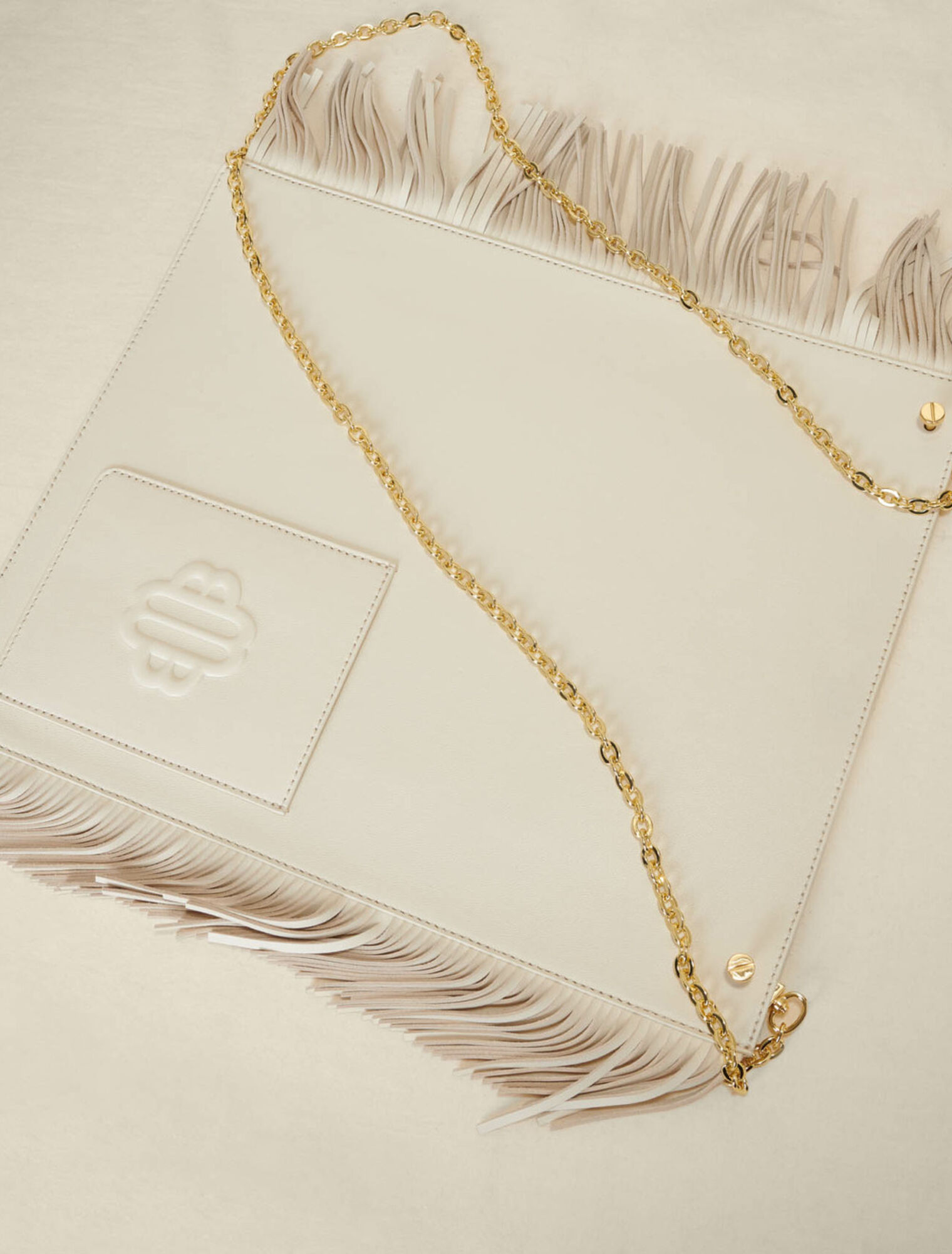 Clover fringed leather bag