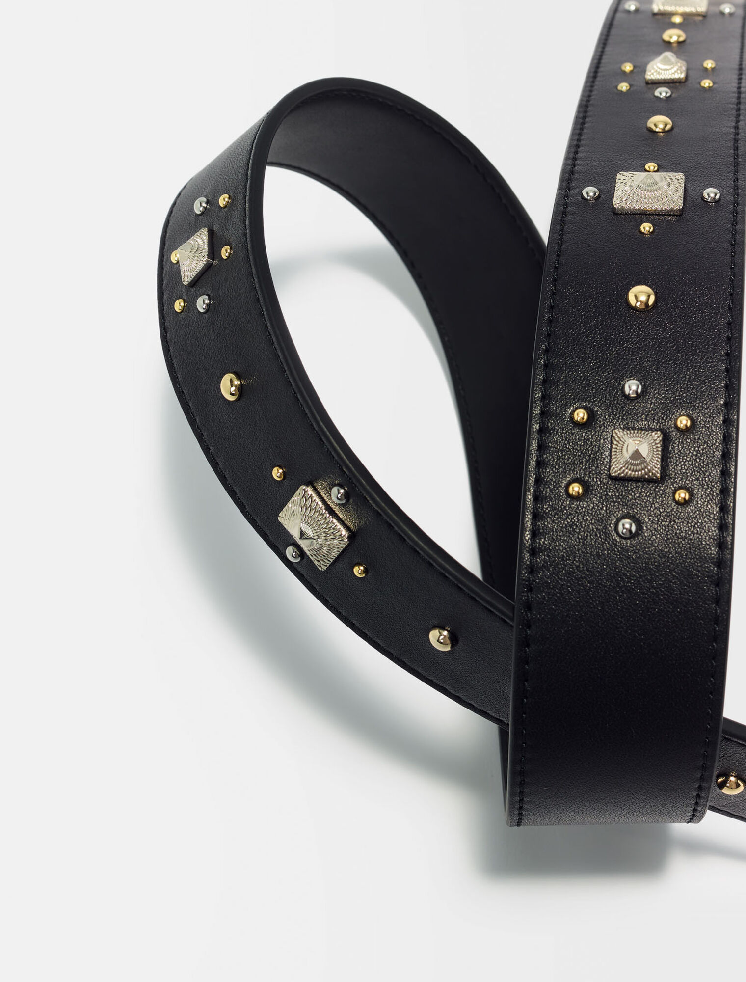 Studded leather shoulder strap