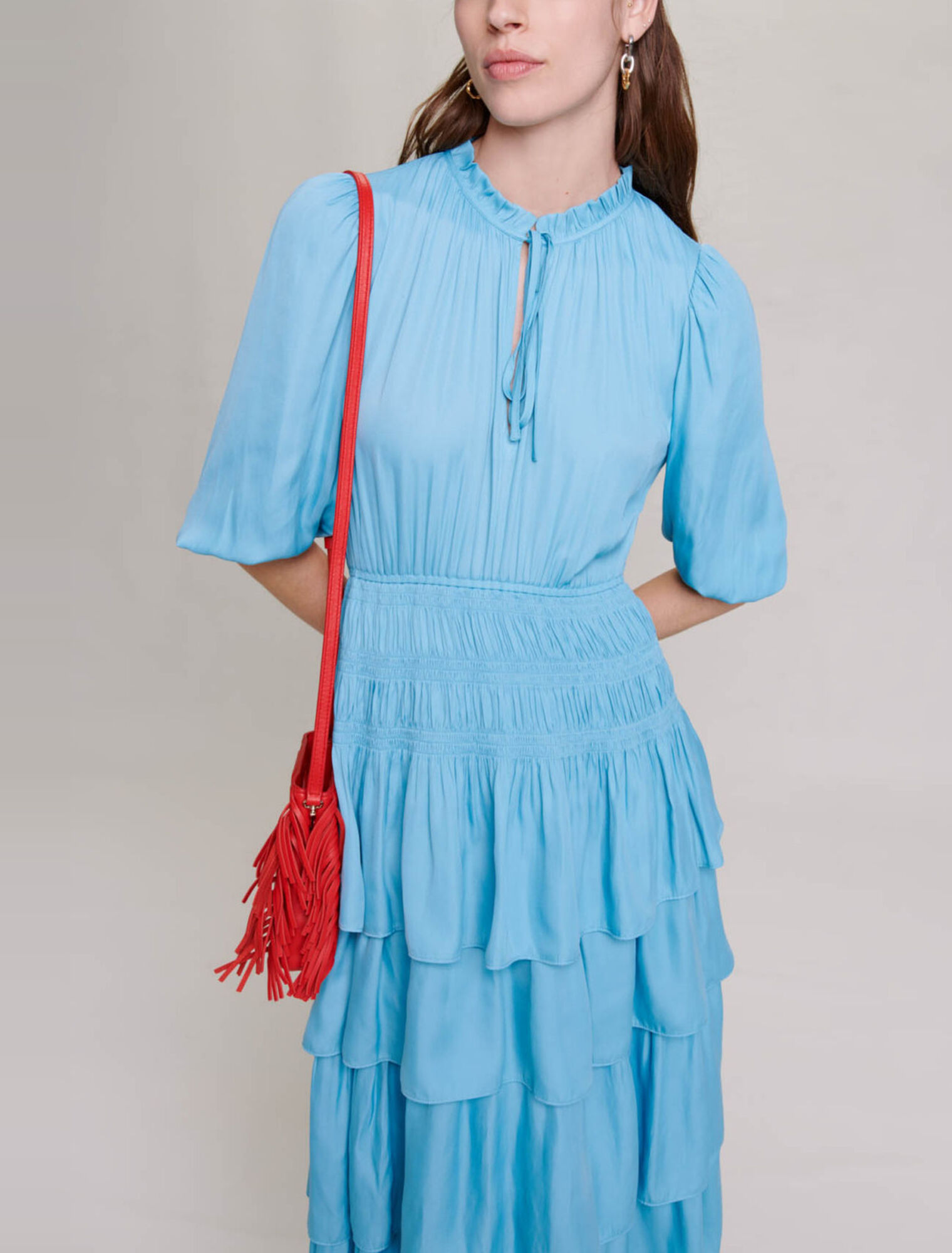 Long satiny dress with ruffles