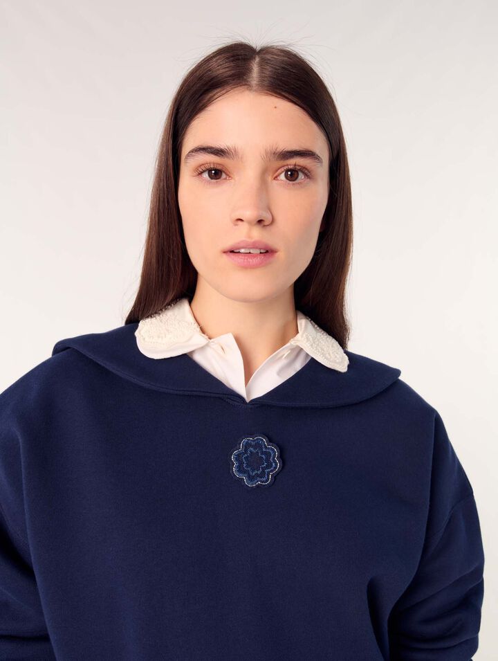 Short sweater with embroidery