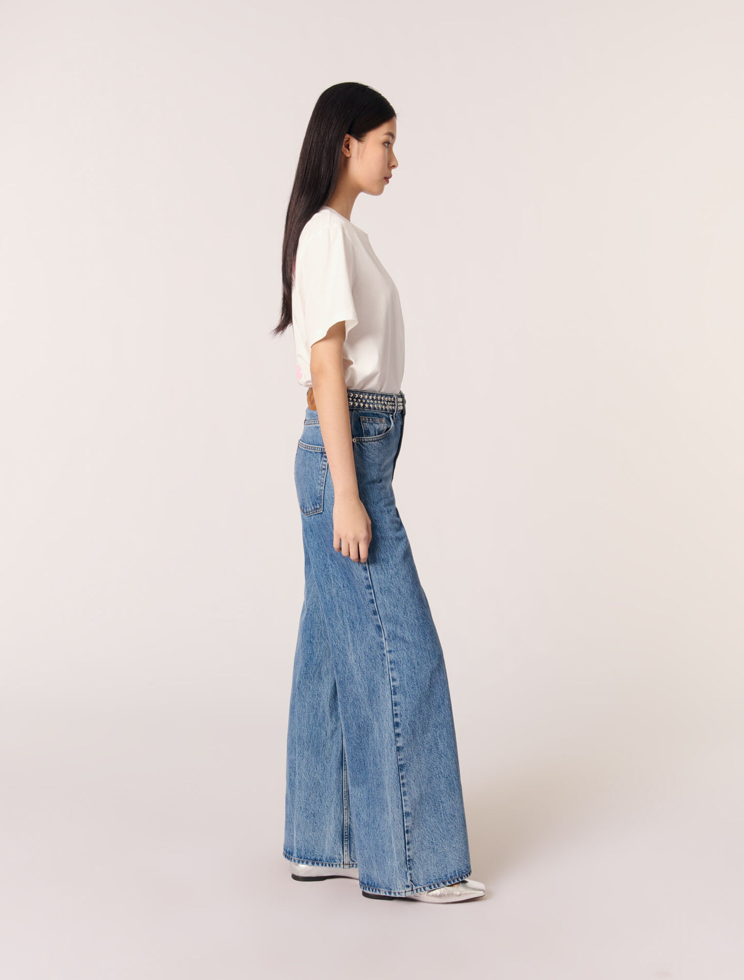Flared jeans with studded waistband