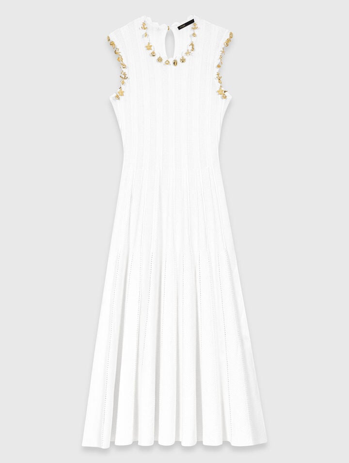 Knit dress with gold jewellery