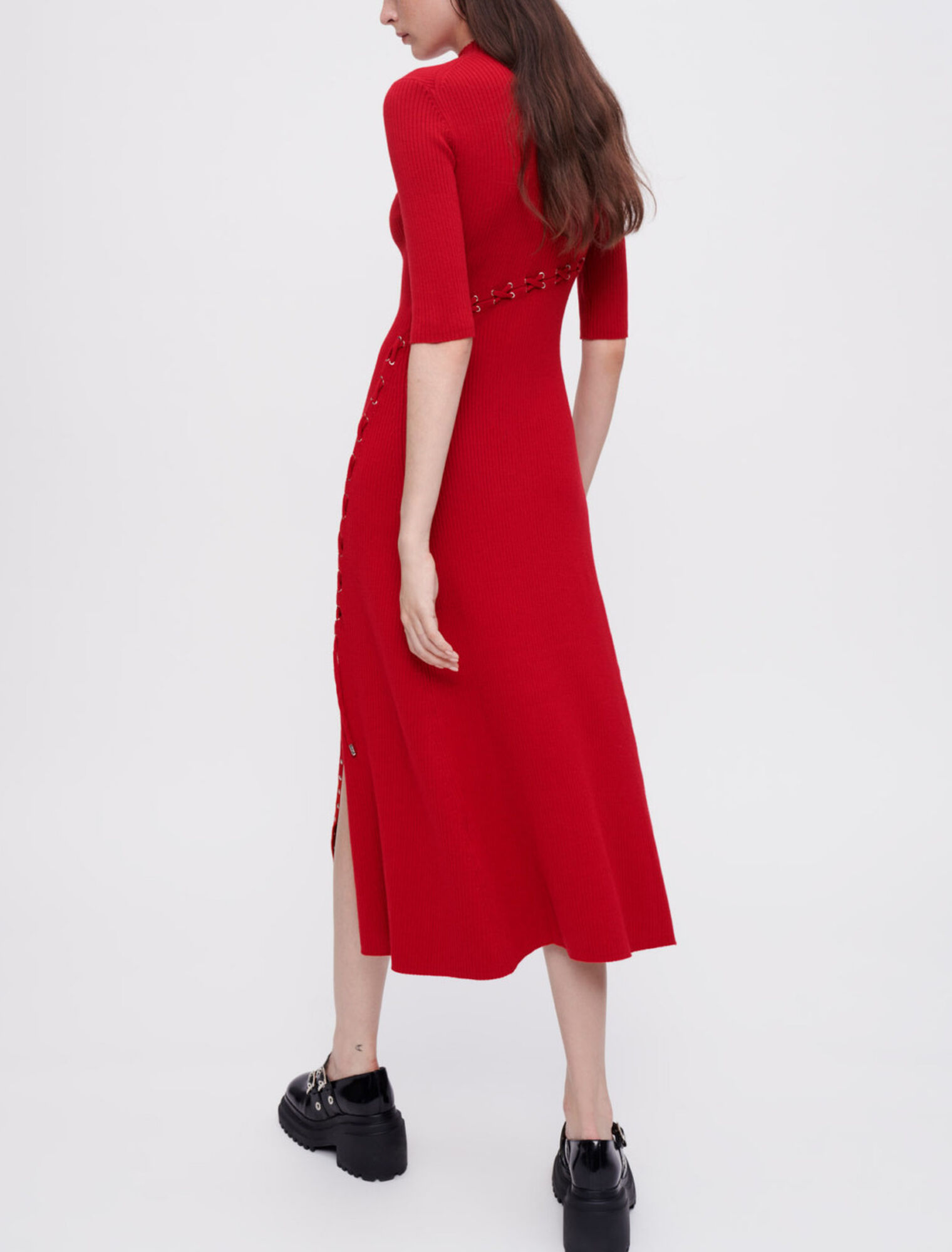 Ribbed knit dress with gold eyelets