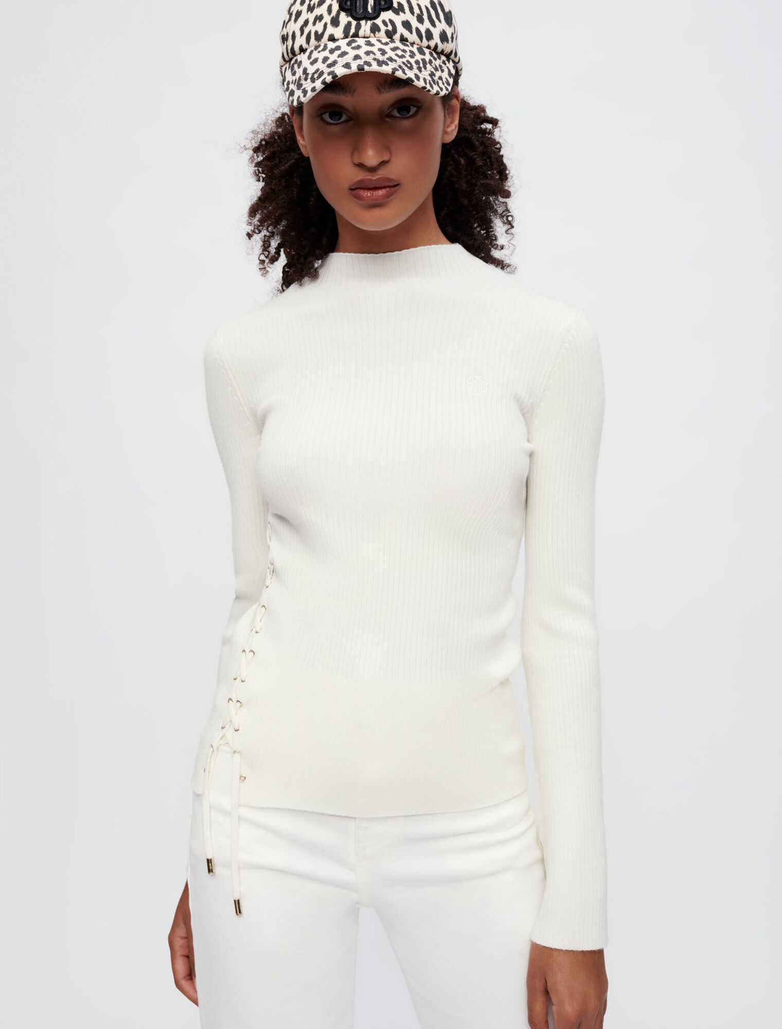 Ribbed sweater with gold metal eyelets White For Women | Maje