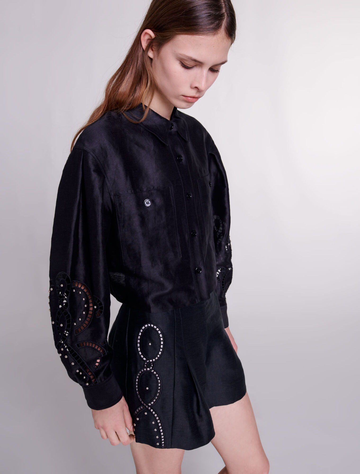Openwork linen shorts with rivets