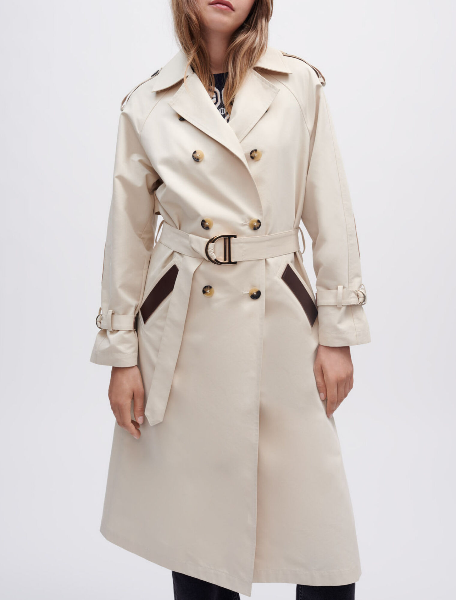 Trench coat with smocking at the back