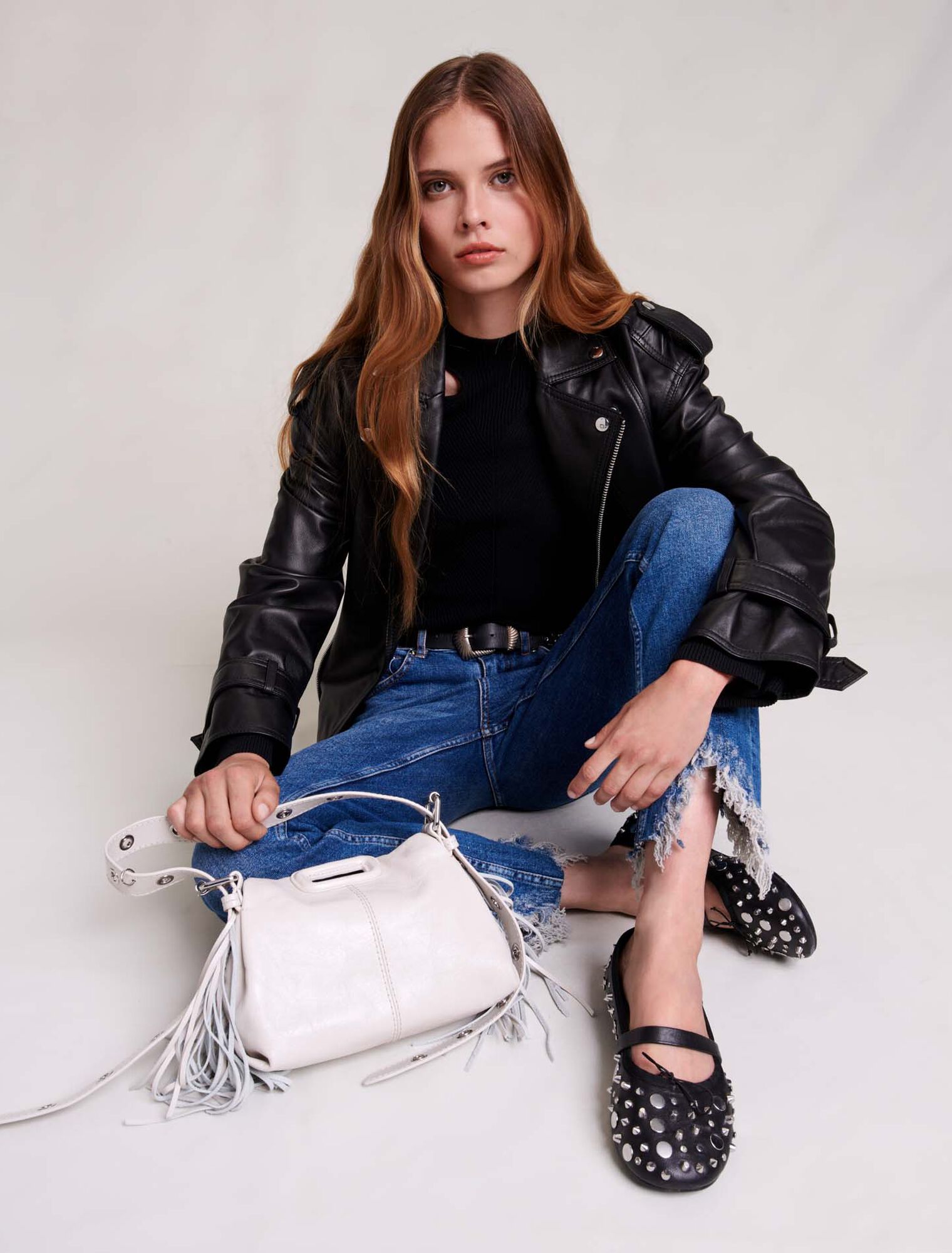 Slim-fit jeans, ripped at the bottom