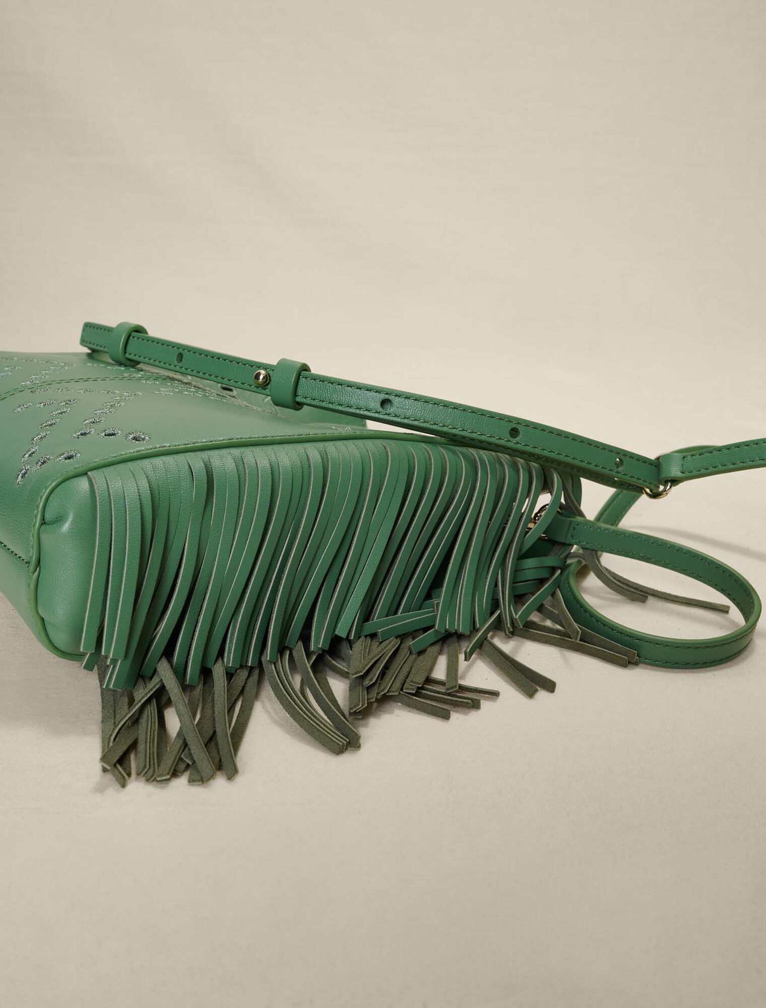 Perforated, fringed leather M bag