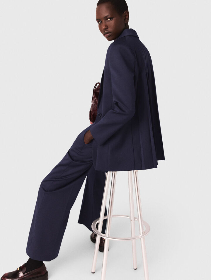Suit jacket with pleated back