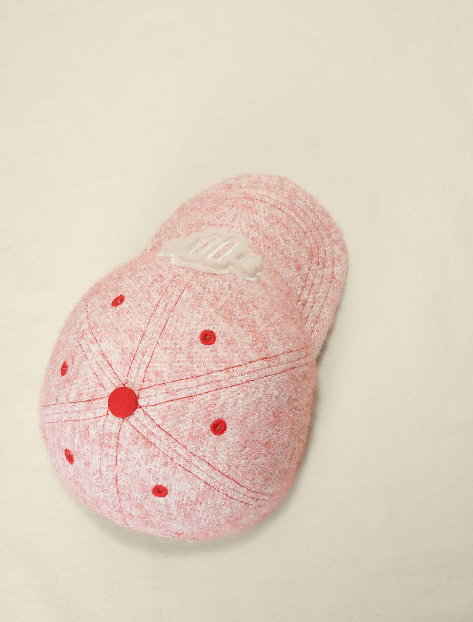 Pink tweed-effect baseball cap