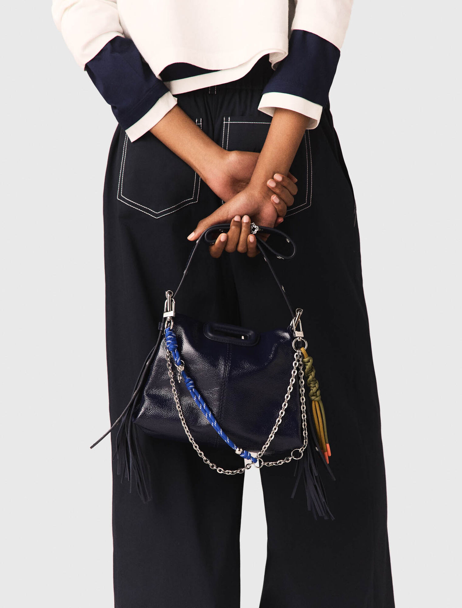 Cotton trousers with leather belt