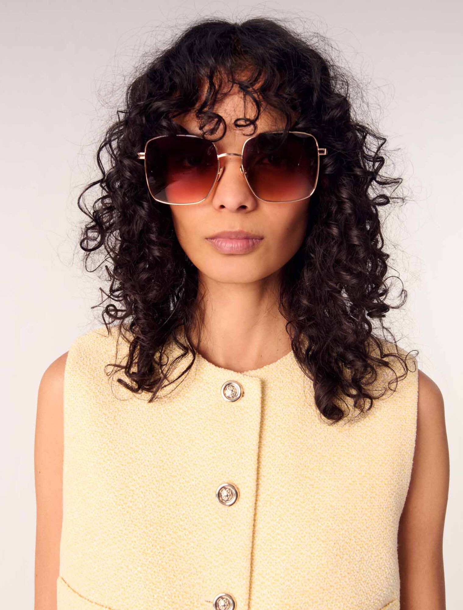 Tweed sleeveless jacket 