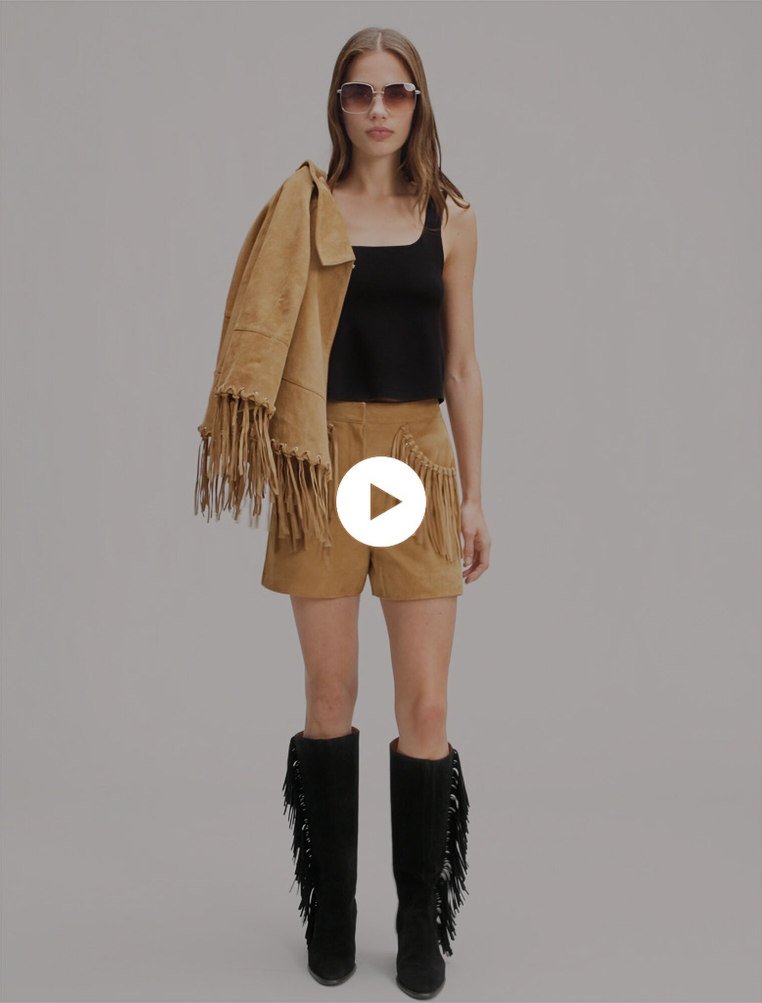 Fringed leather shorts