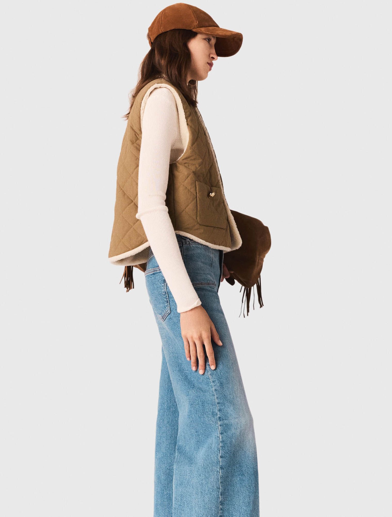 Short sleeveless puffer jacket Short sleeveless puffer jacket