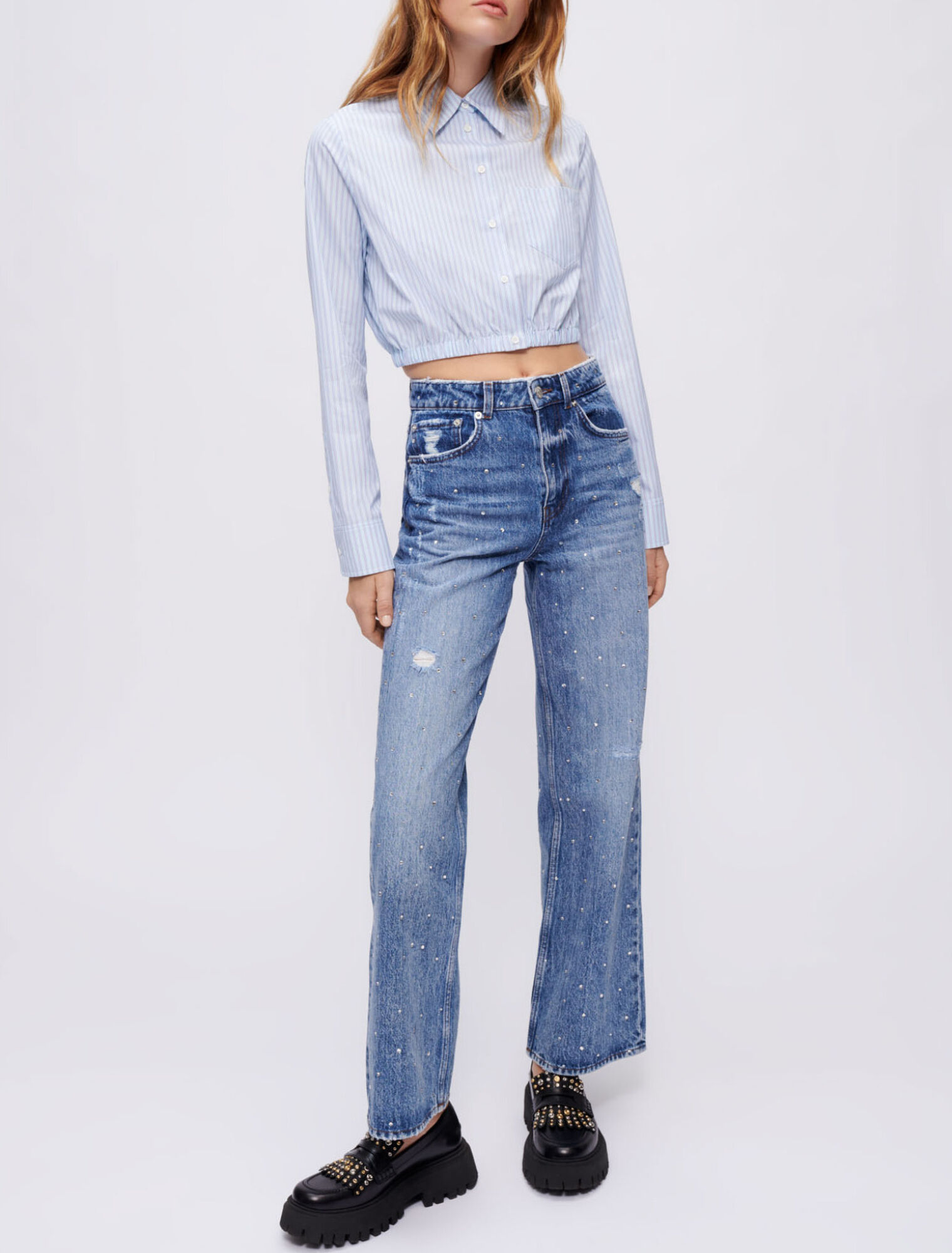 High-waisted jeans with rhinestones