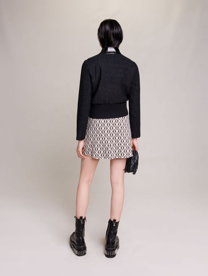 Tweed and vinyl jacket