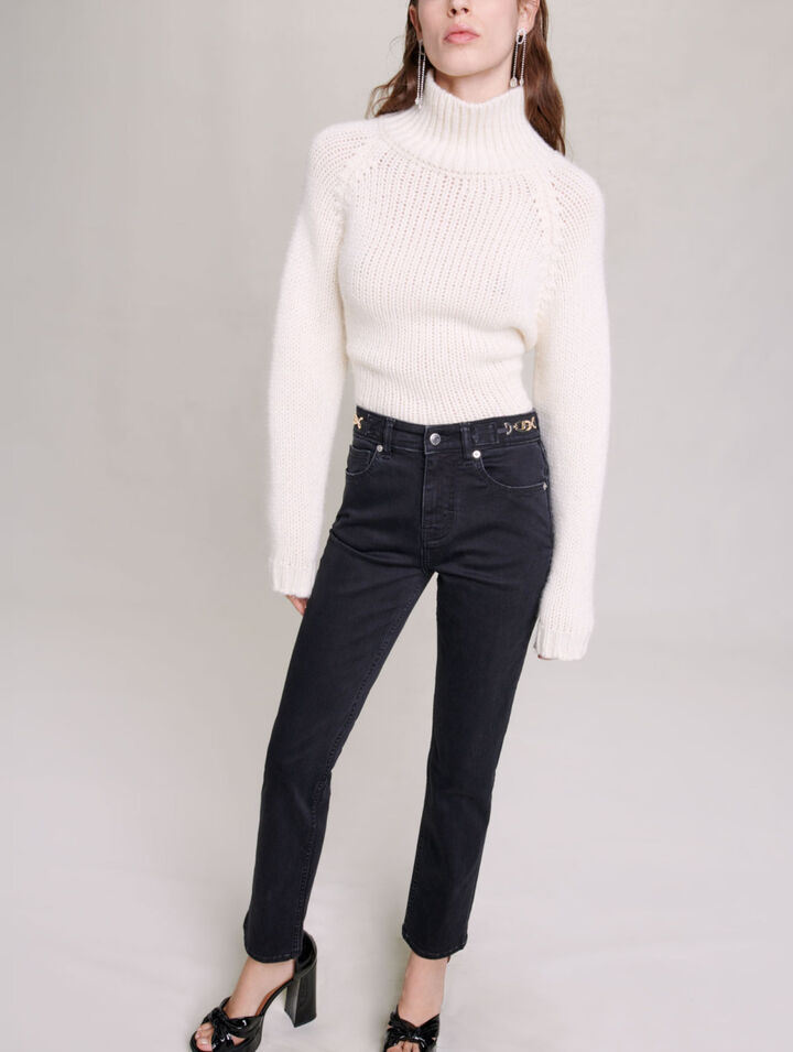 Jeans with curb chains and fringing