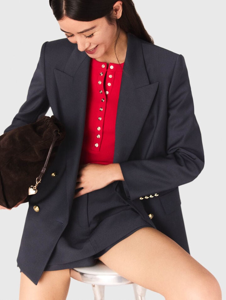 Suit jacket with gold buttons