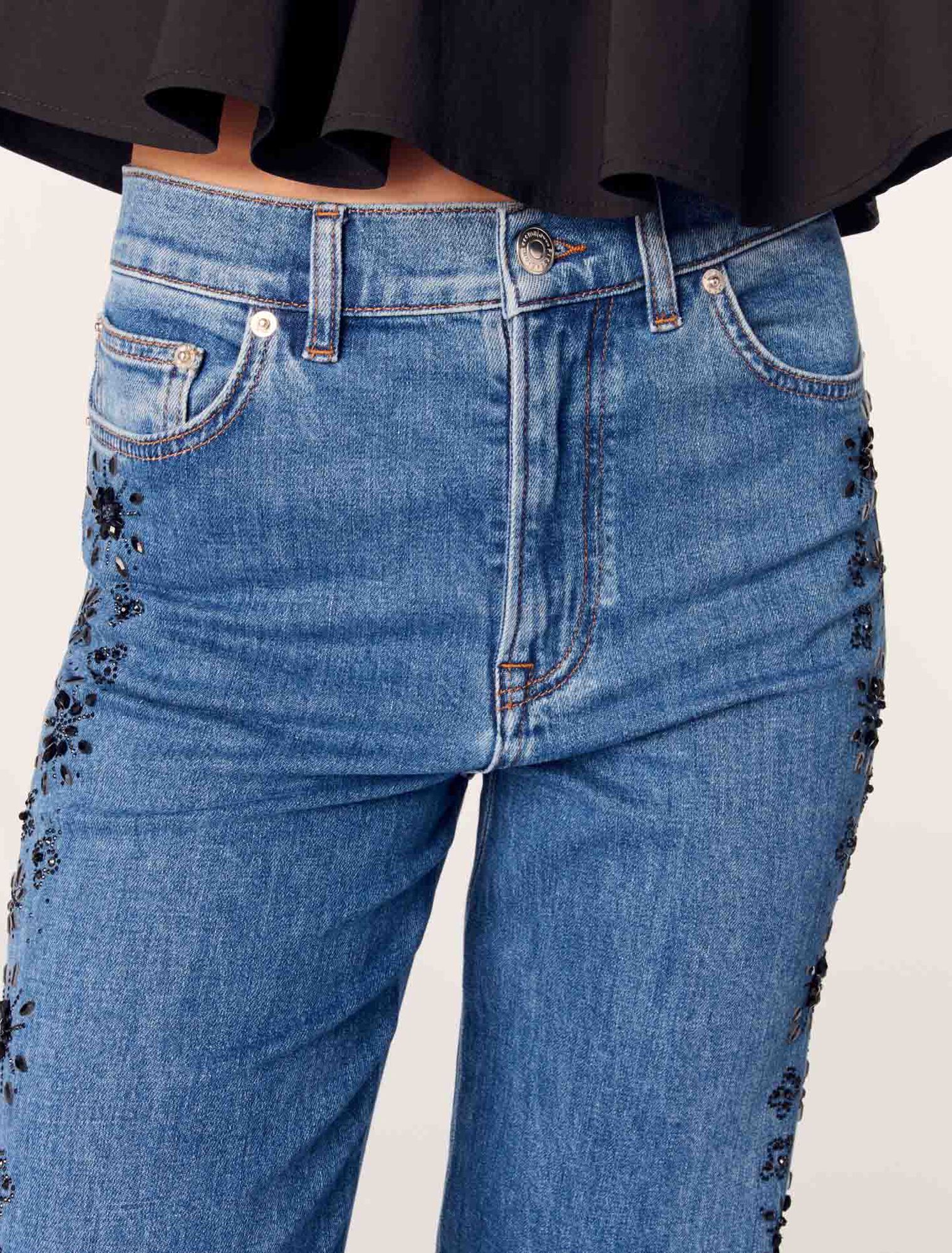 Embroidered jeans with rhinestones